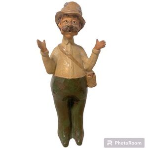 VINTAGE FISHERMAN WITH TACKLE BAG SCULPTURE